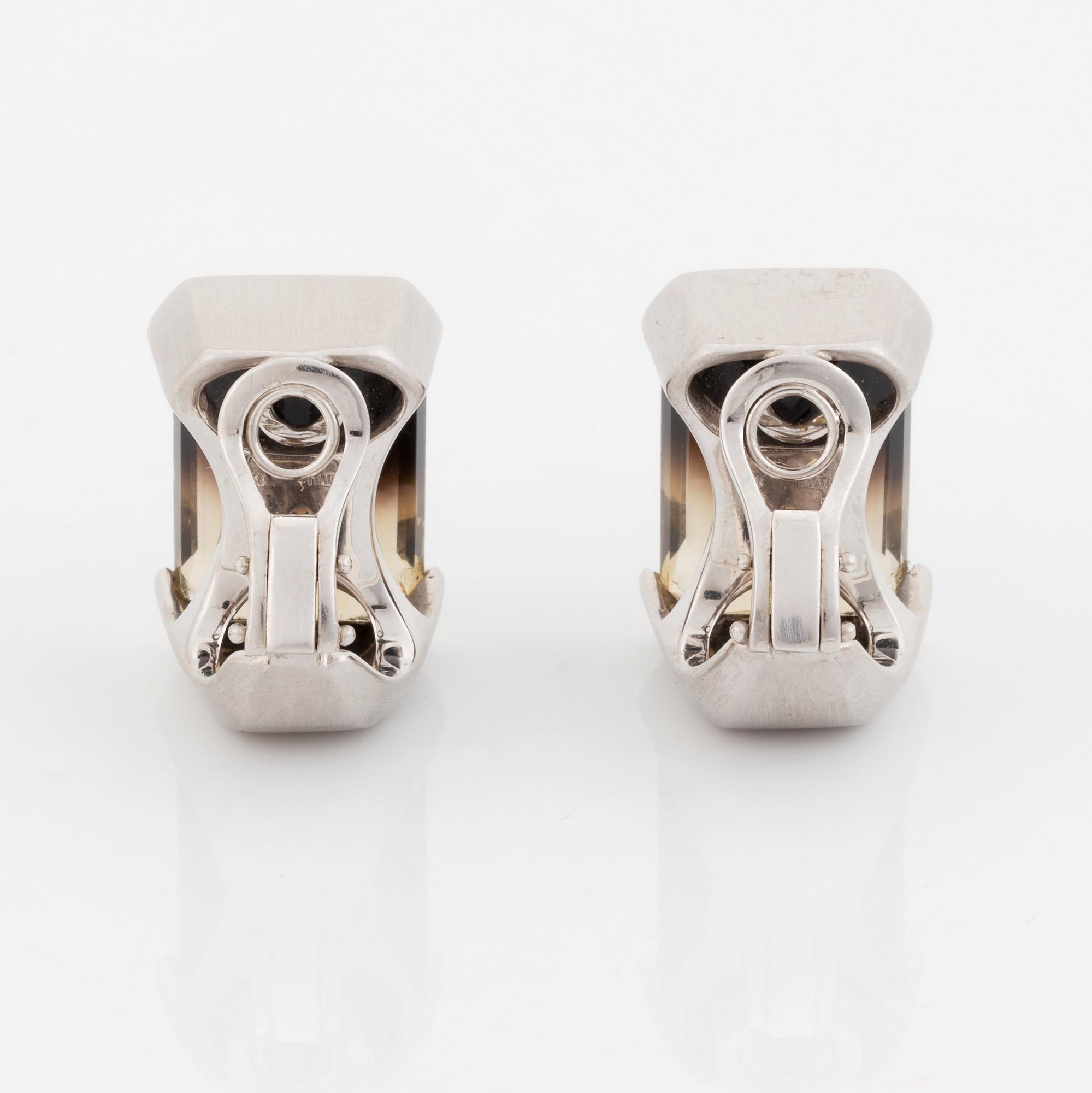 A pair of Tina Karlsson earrings in 18K white gold set with facted quartz.