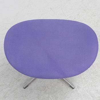 Arne Jacobsen, an armchair with footstool, "The Egg", Fritz Hansen, Denmark, 2003.