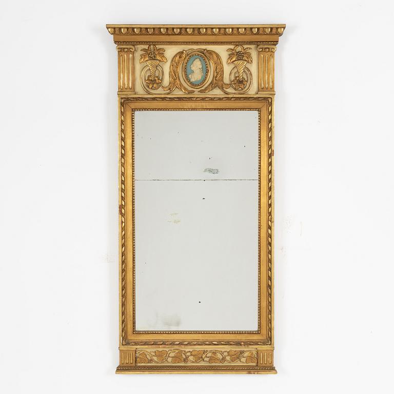 A Gustavian style mirror, circa 1900.