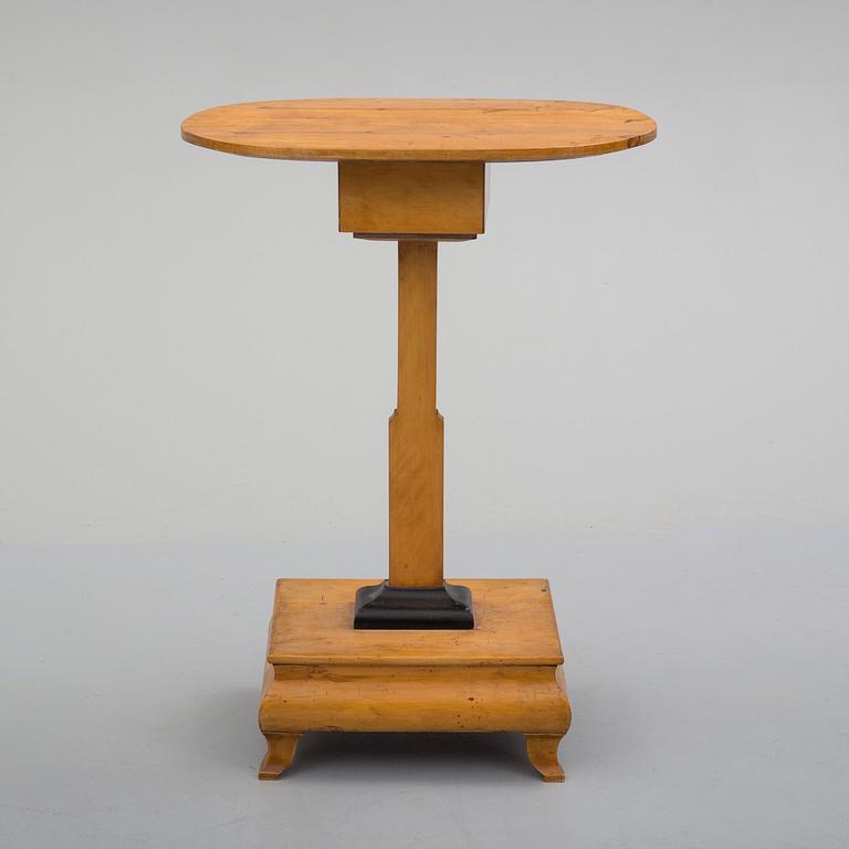 A 19th century sewing table.