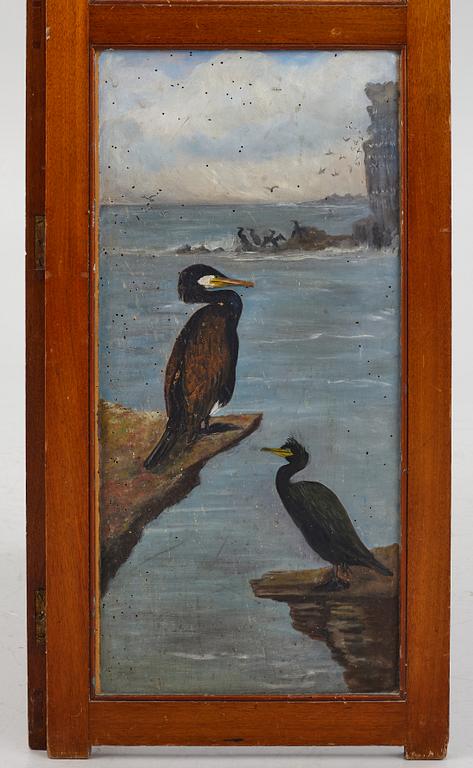 A folding screen, late 19th century.