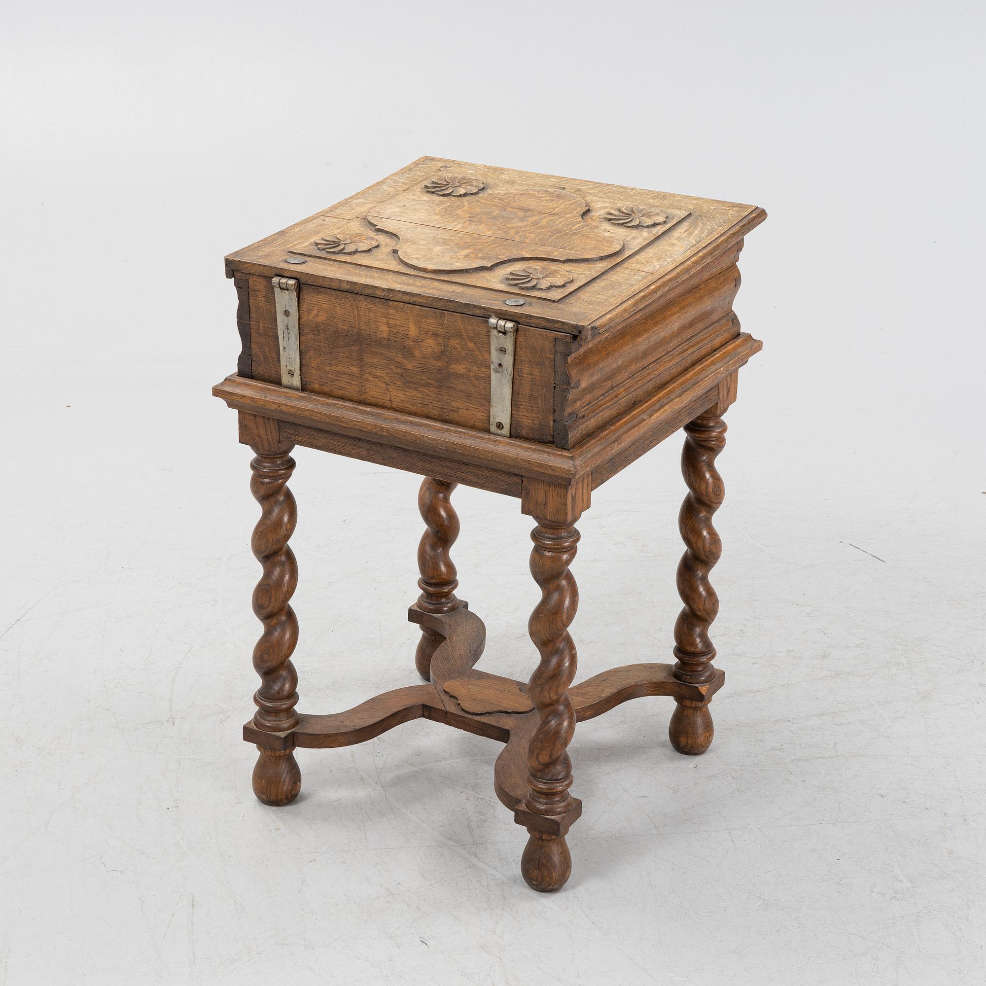 A baroque style oak chest, around 1900.