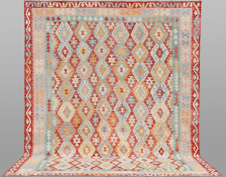 A Kilim carpet, approx. 345 x 272 cm.