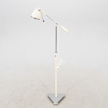 A mid 1900s industrial floor lamp.