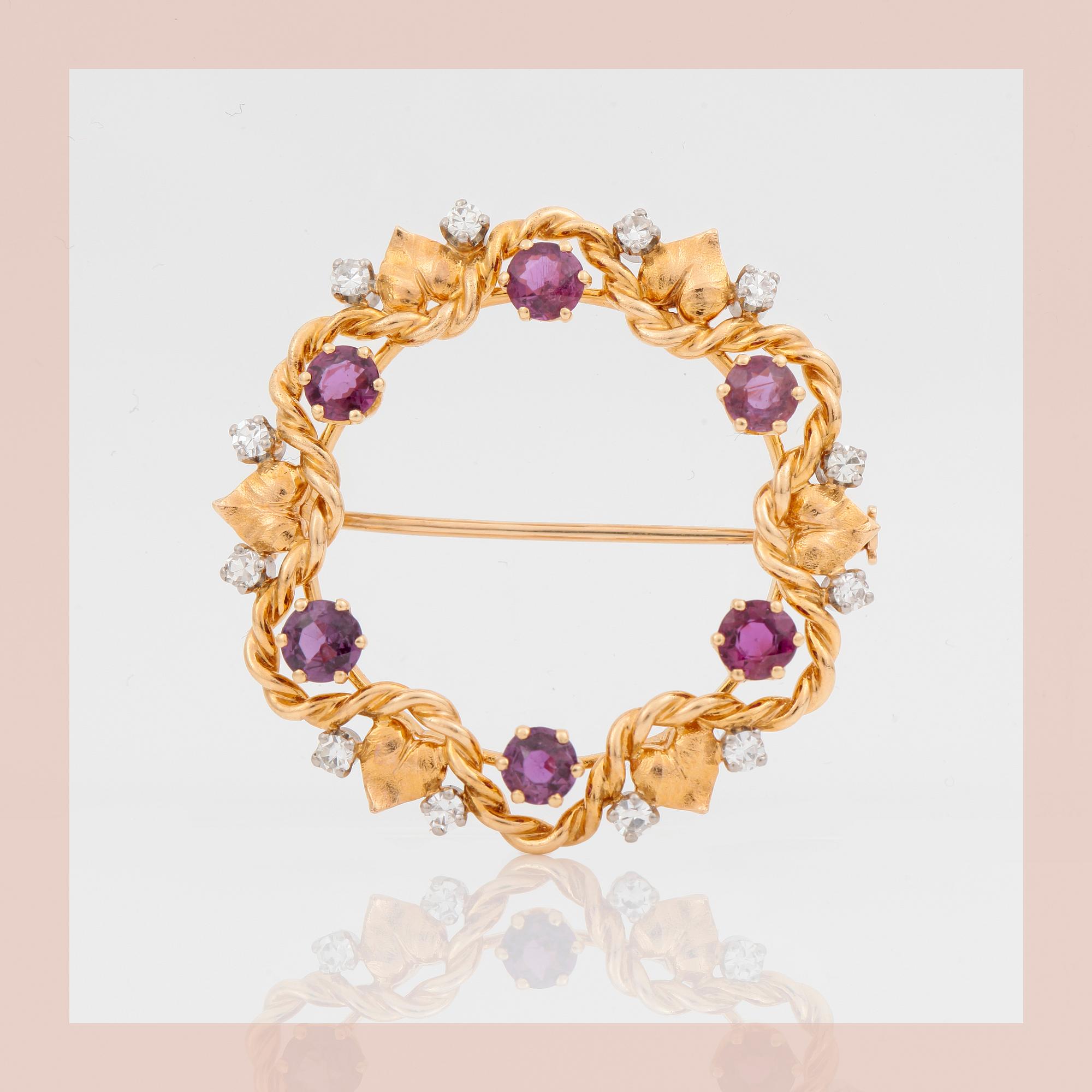BROSCH, W.A Bolin, Stockholm, 1948, med diamanter samt rubiner.