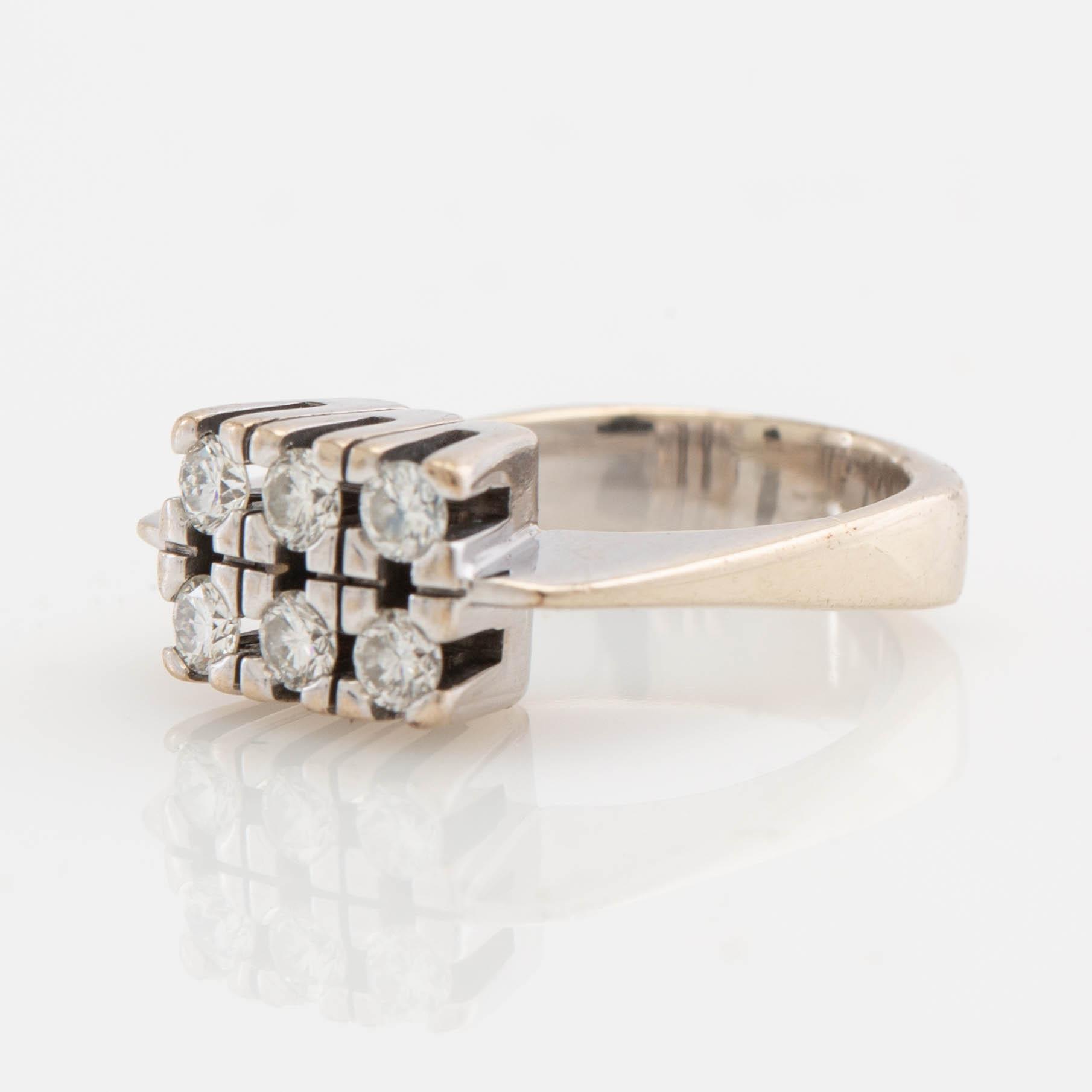 Ole Lynggaard, ring, 14K guld med runda brilliantslipade diamanter.