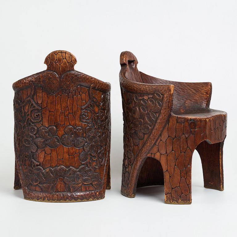 Gustaf Fjaestad, a pair of Art Nouveau carved pine chairs "stabbestolar", Arvika Sweden 1908-1909.