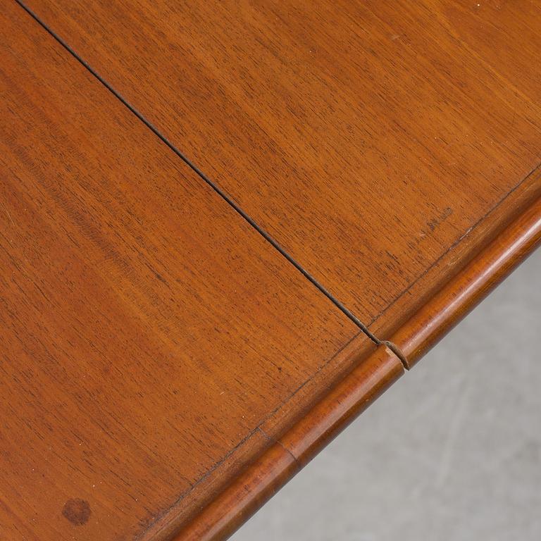 A 19th century mahogany table with drawer.