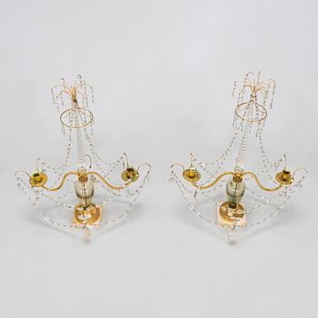 A pair of gilt bronze and glass two-light girandoles, Russia 18th/19th century.