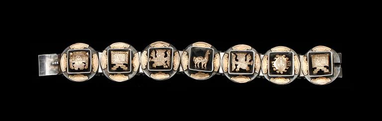 ARMBAND, silver detaljer i 18k guld. 1900-talets andra hälft. Vikt tot 47,5 g.