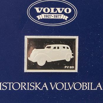 Twelve silver plaques with Volvo cars by Franklin Mint 1978.