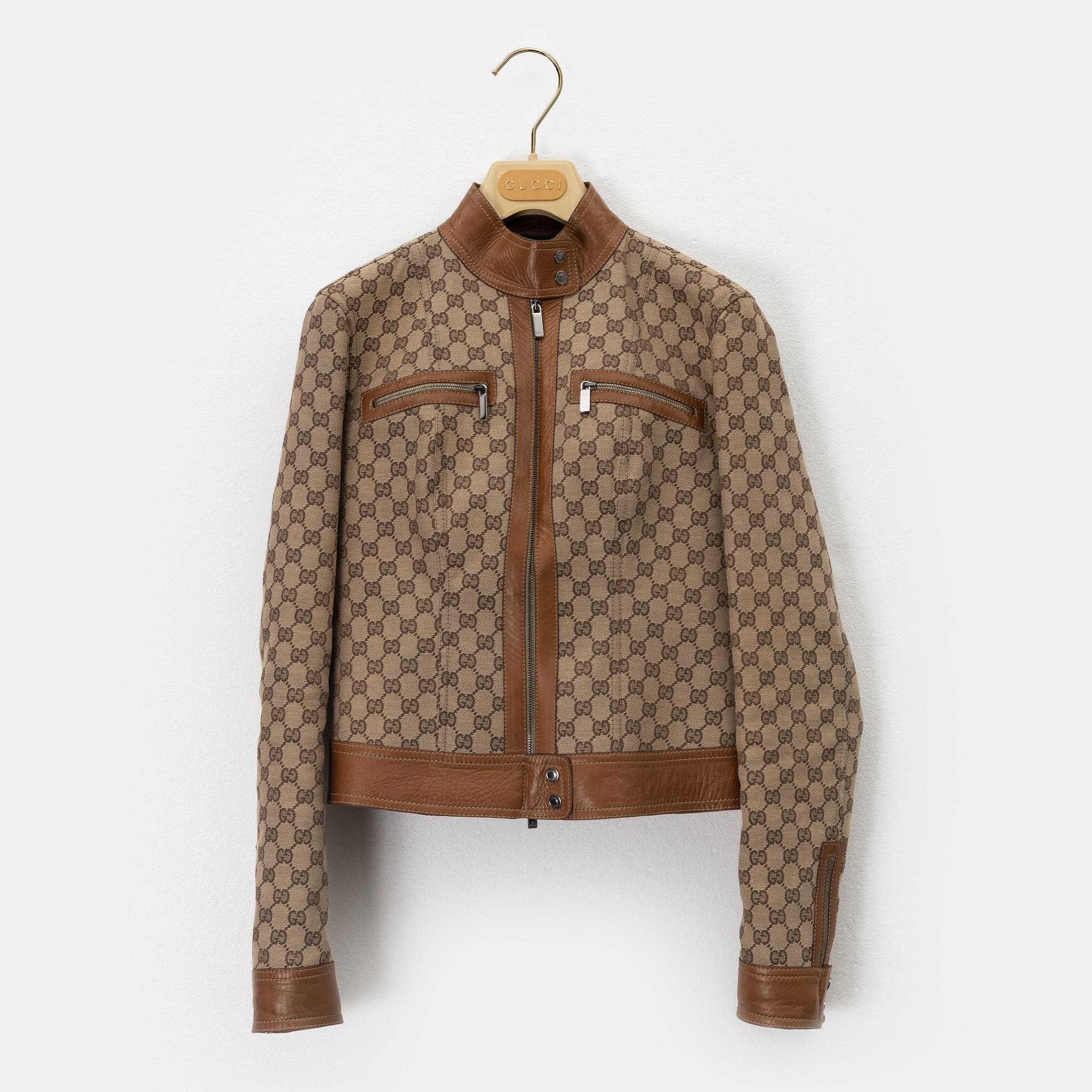 Gucci, a GG supreme jacket and shorts, size 38, 2000.