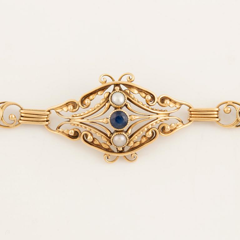 Gold, pearl and sapphire bracelet.