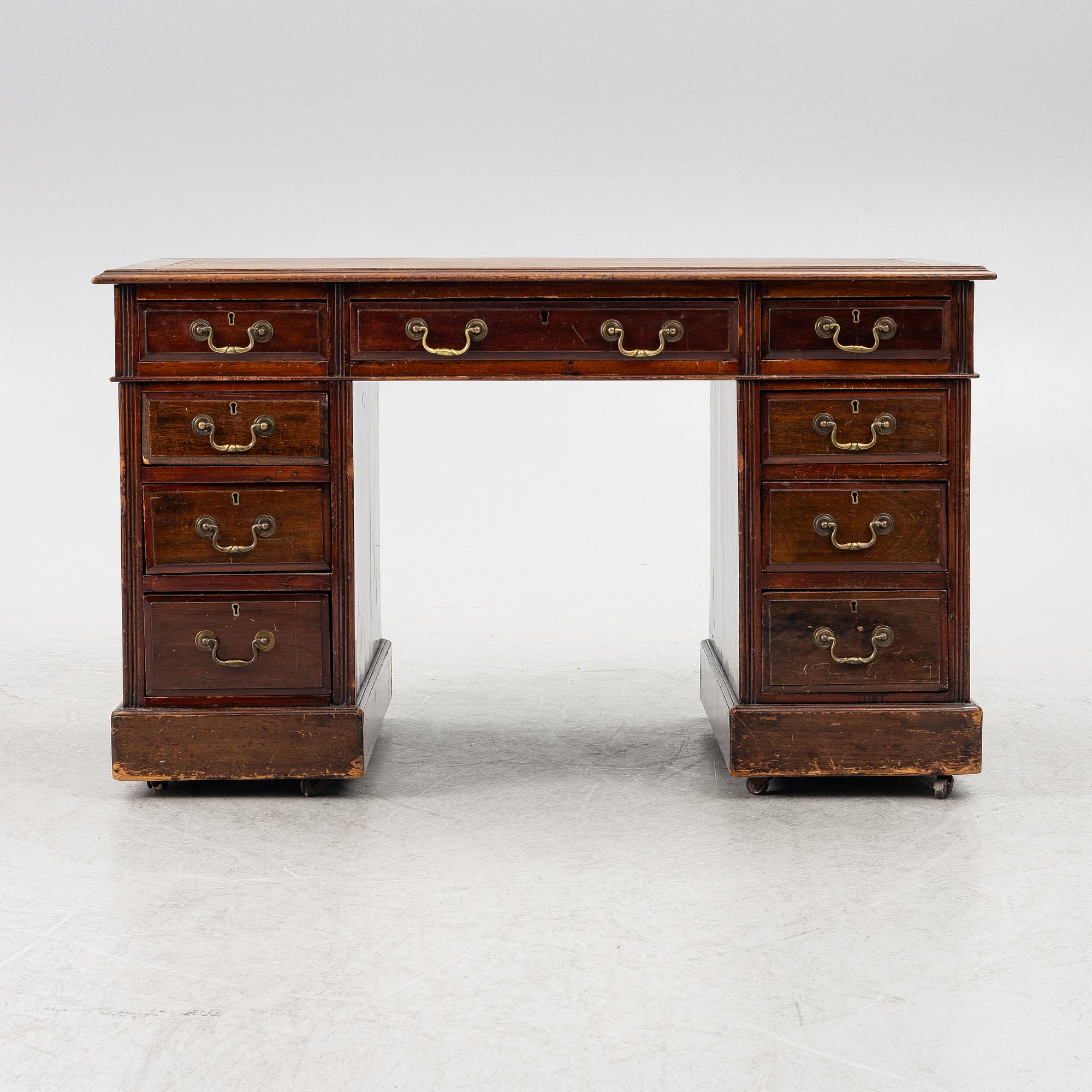 An English style desk, circa 1900.