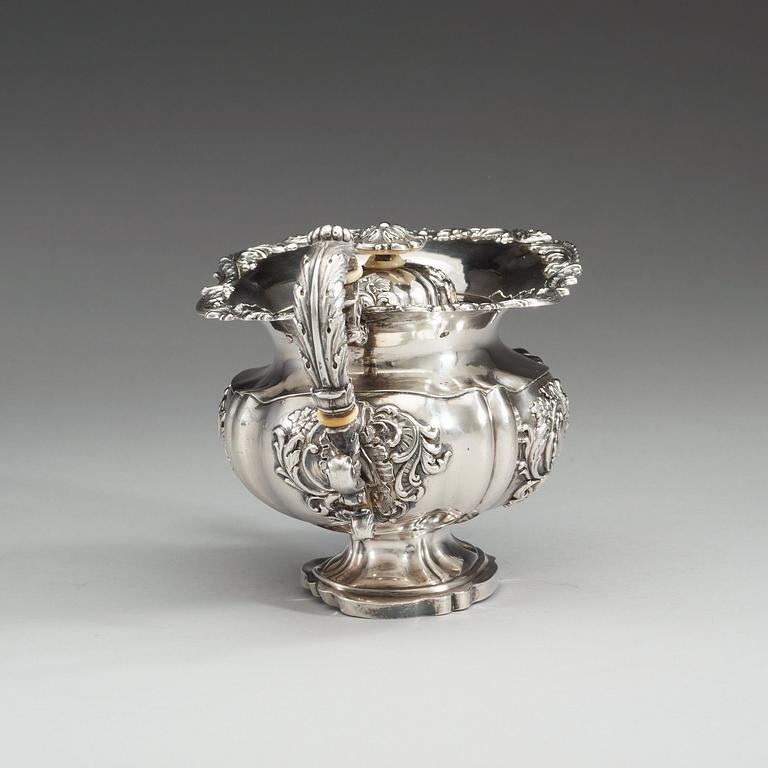 A Russian 19th century parcel-gilt tea-jug, makers mark of Alexander Korder, St. Petersburg 1840.