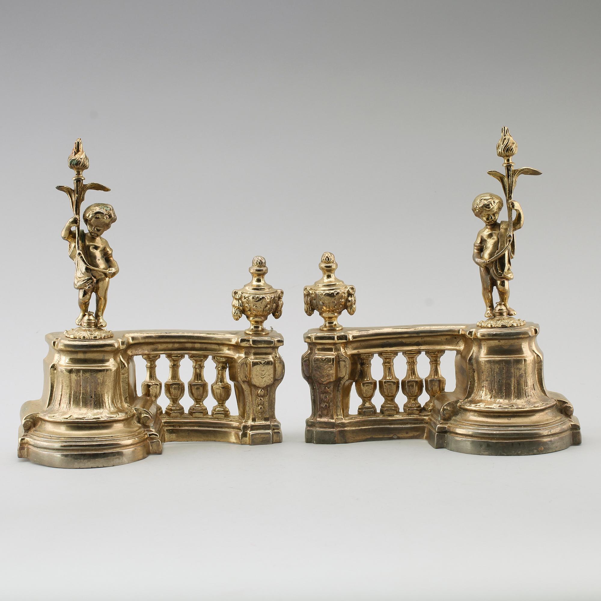 ELDHUNDAR, 1 par, förgylld metall, England, 1900-/2000-tal.