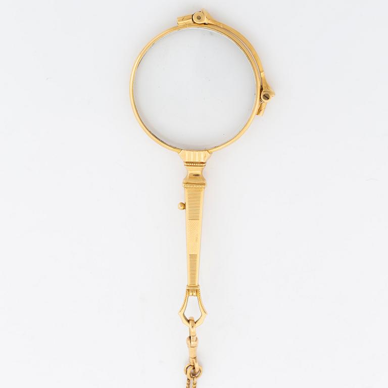 18K gold lornet.