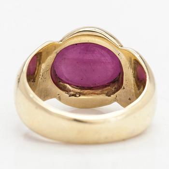 A 14K gold ring with a ruby.