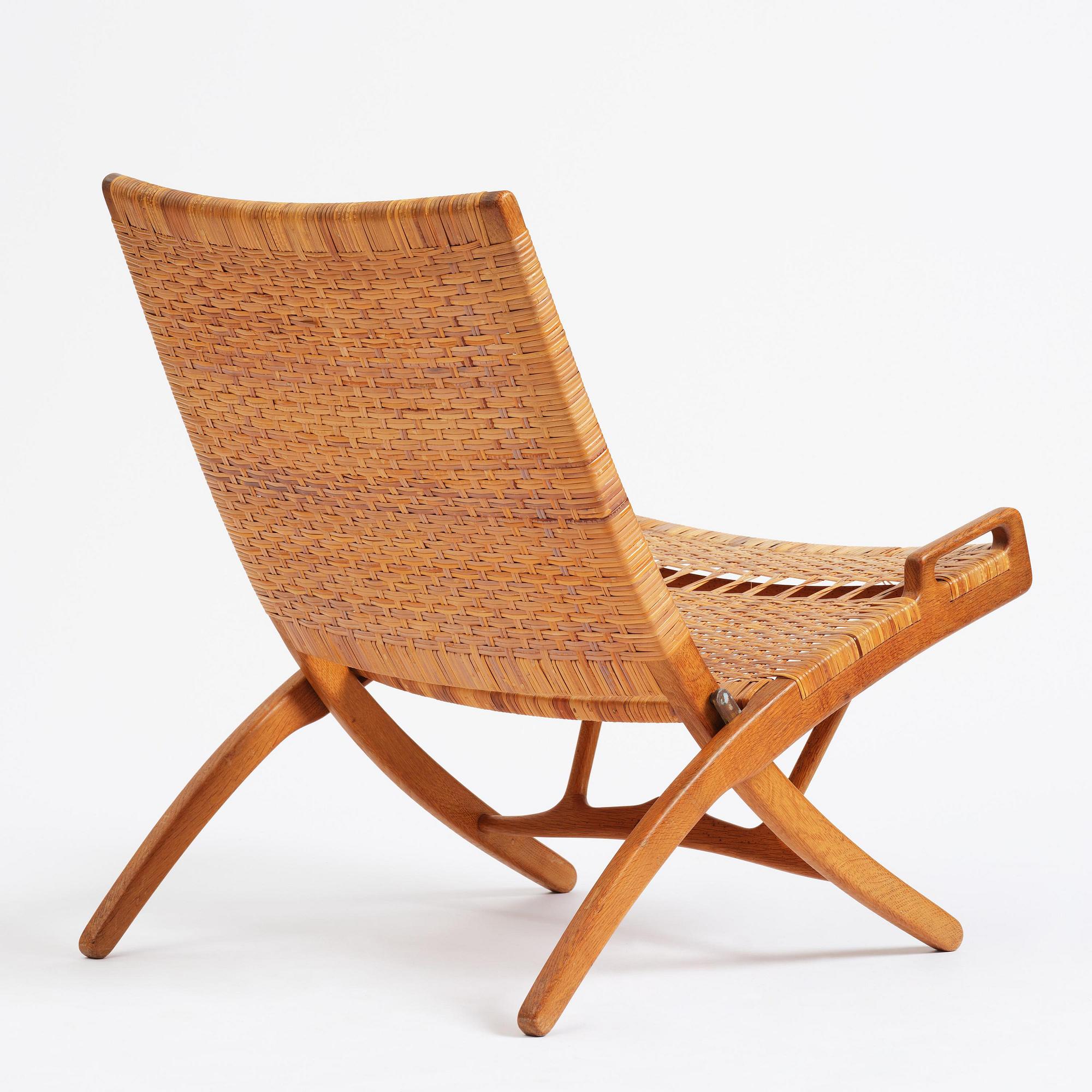 Hans J. Wegner, a foldable easy chair model 512, Johannes Hansen, Copenhagen, 1950s-60s.