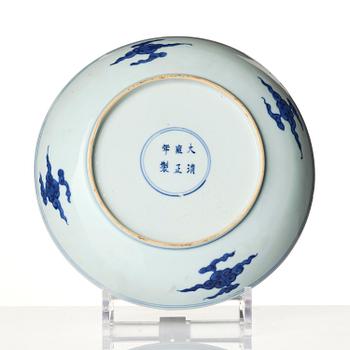 A blue and white 'dragon' dish, Qing dynasty with Yongzheng six character mark and of the period (1723-35).