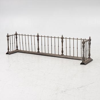An English brass fire gate, circa 1800.