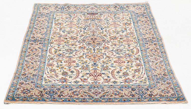 A rug, semi-antique, Esfahan, signed Ghena, ca 166 x 109 cm.