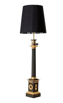A pair of French late Empire table lamps.