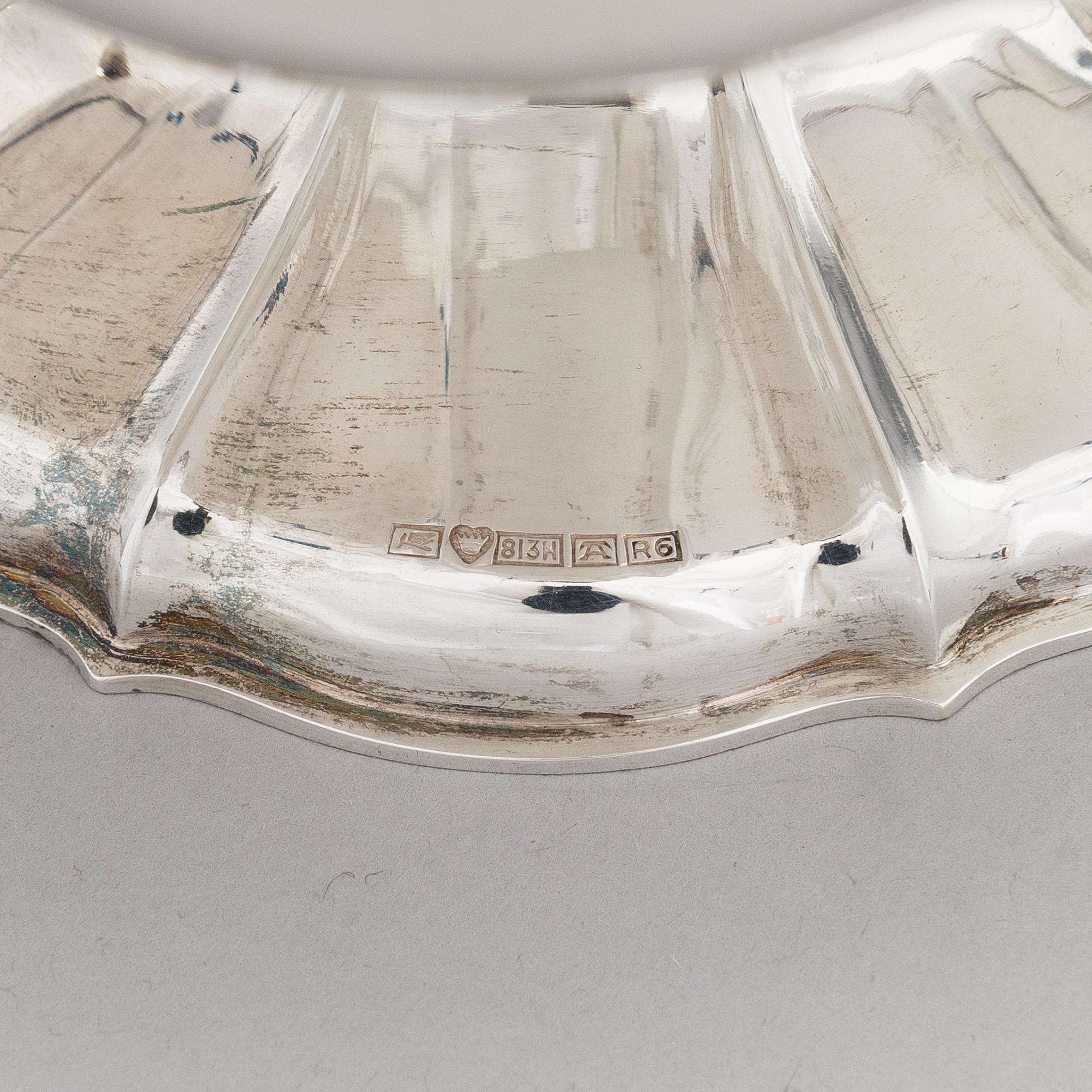 A silver coffee pot, a parcel-gilt sugar bowl and cream jug, Turku Finland 1946 and 1985.