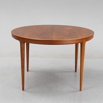 A walnut dining table by Bertil Fridhagen, Bodafors, 1960's.