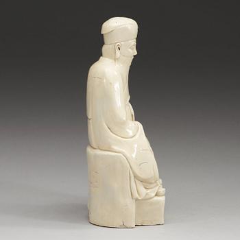 A blanc de chine figure of a deity, Qing dynasty, 17th Century.