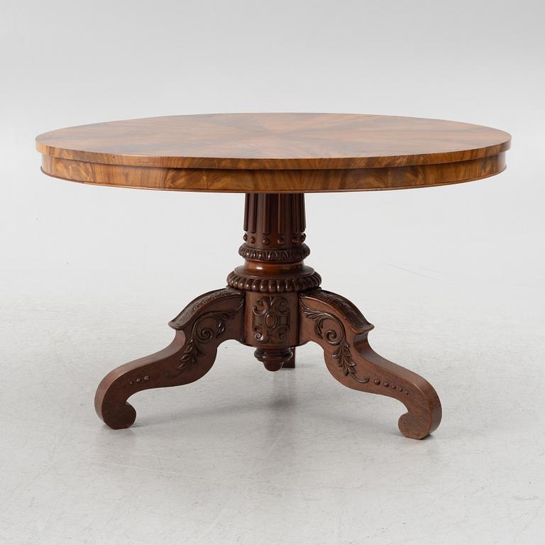 A mahogany salon table, around the mid-19th Century.