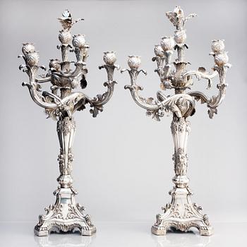 A pair of Swedish mid 19th century silver candelabra, marks of Gustaf Möllenborg, Stockholm 1844.