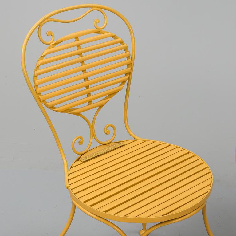 A set of six garden chairs and a table, (7parts), chairs signed Skoglund & Olson Gefle. Ca 1900.