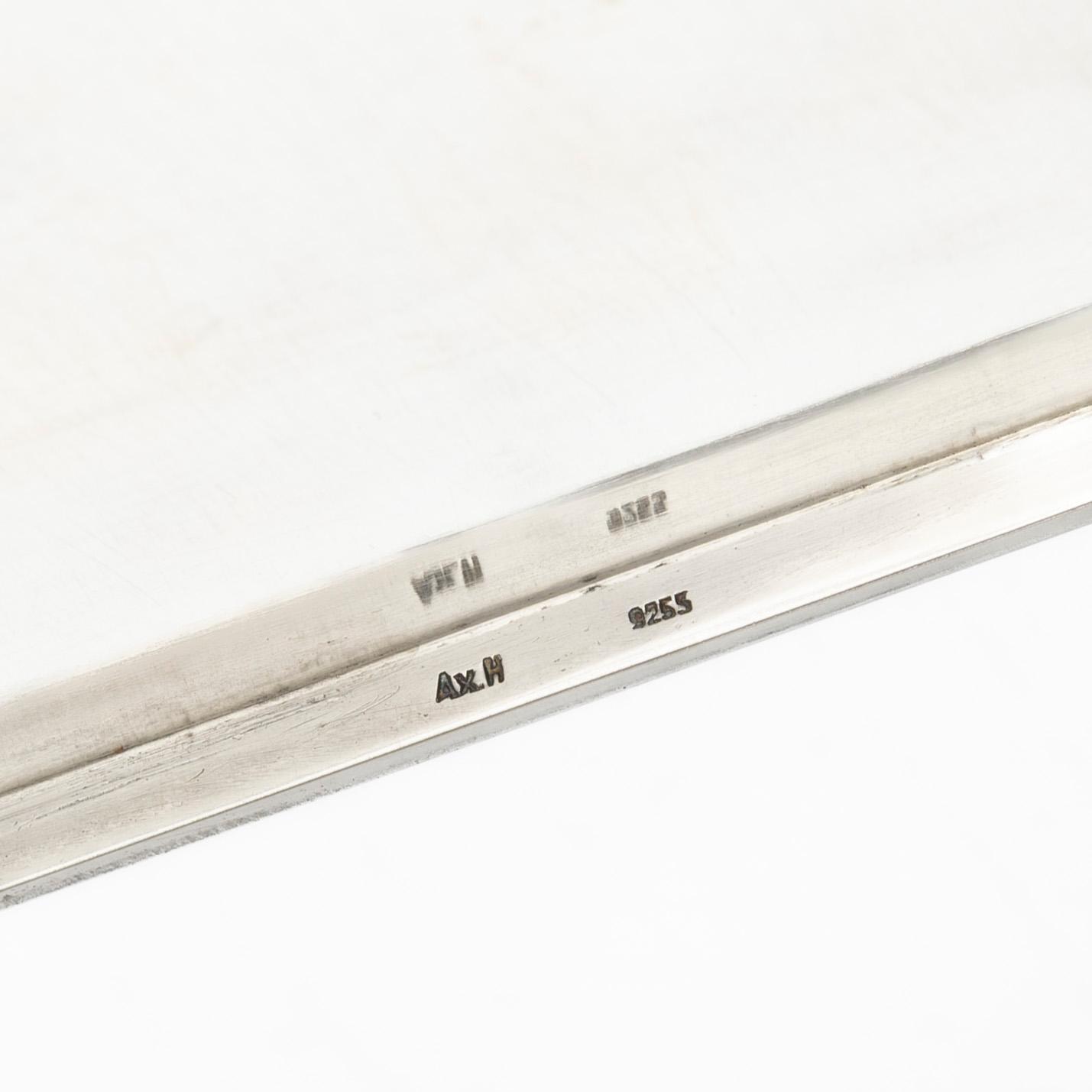 A 20th century sterling silver cigar-box.