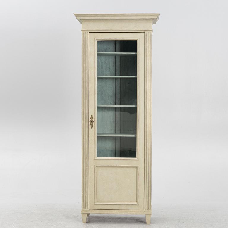 A display cabinet, late 19th Century.