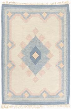A flat weave carpet, signed GG, ca 236 x 161 cm.