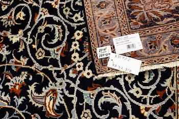 A Kashan carpet, c. 383 x 310 cm.