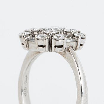 A ca 1.20 cts brilliant- princess- and baguette-cut diamond ring.