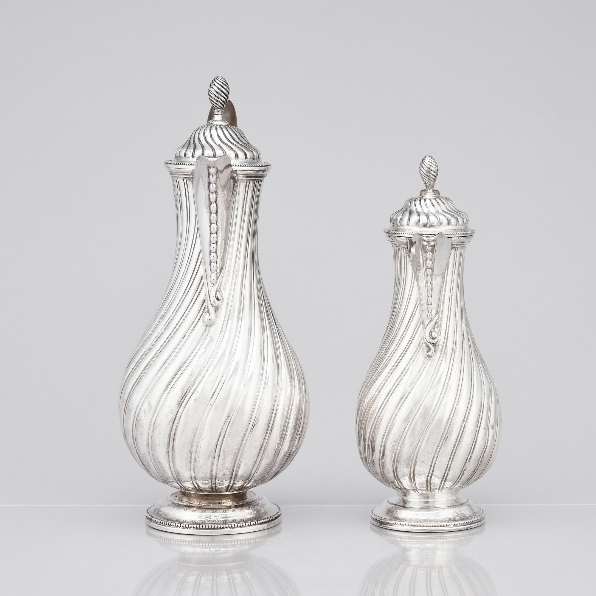 A Victorian silver coffee pot and a milk pot, Martin Hall & Co Ltd, London 1878 and Charles Stuart Harris, London 1877.