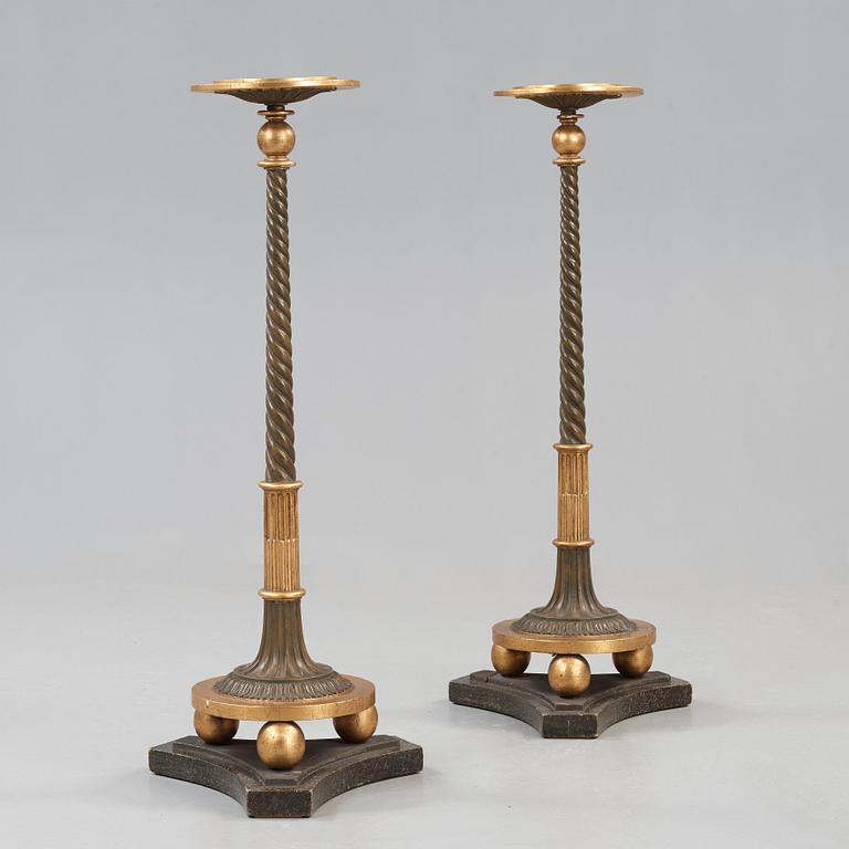 A pair of late Gustavian early 19th century candle stands.