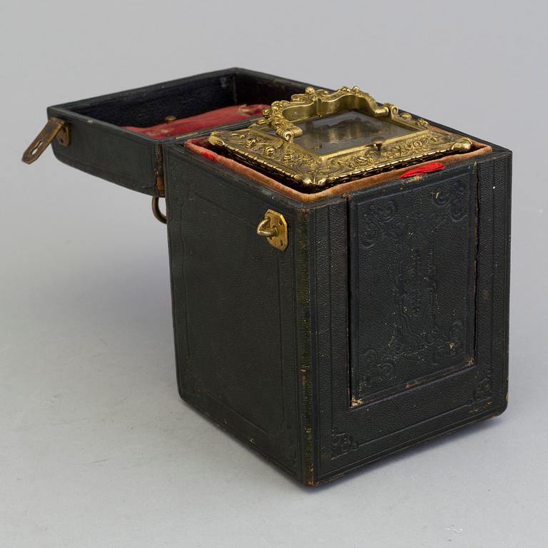 A travelling clock, signed "Potonie Paris", France, second half of the 19th century.