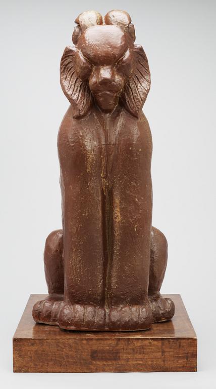 A Michael Schilkin stoneware sculpture of a seated lynx, Arabia.