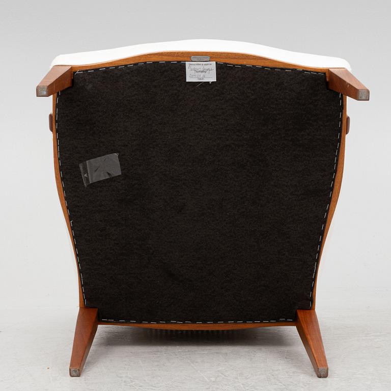 Josef Frank, a pair of armchairs, model 969, Svenskt Tenn.