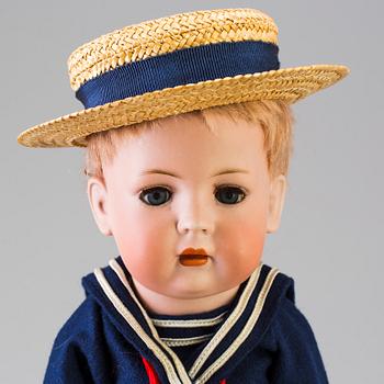 A bisque head boy doll by Baehr & Proeschild for Bruno Schmidt, Germany, ca 1920.