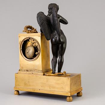 A French empire early 19th century mantel clock.