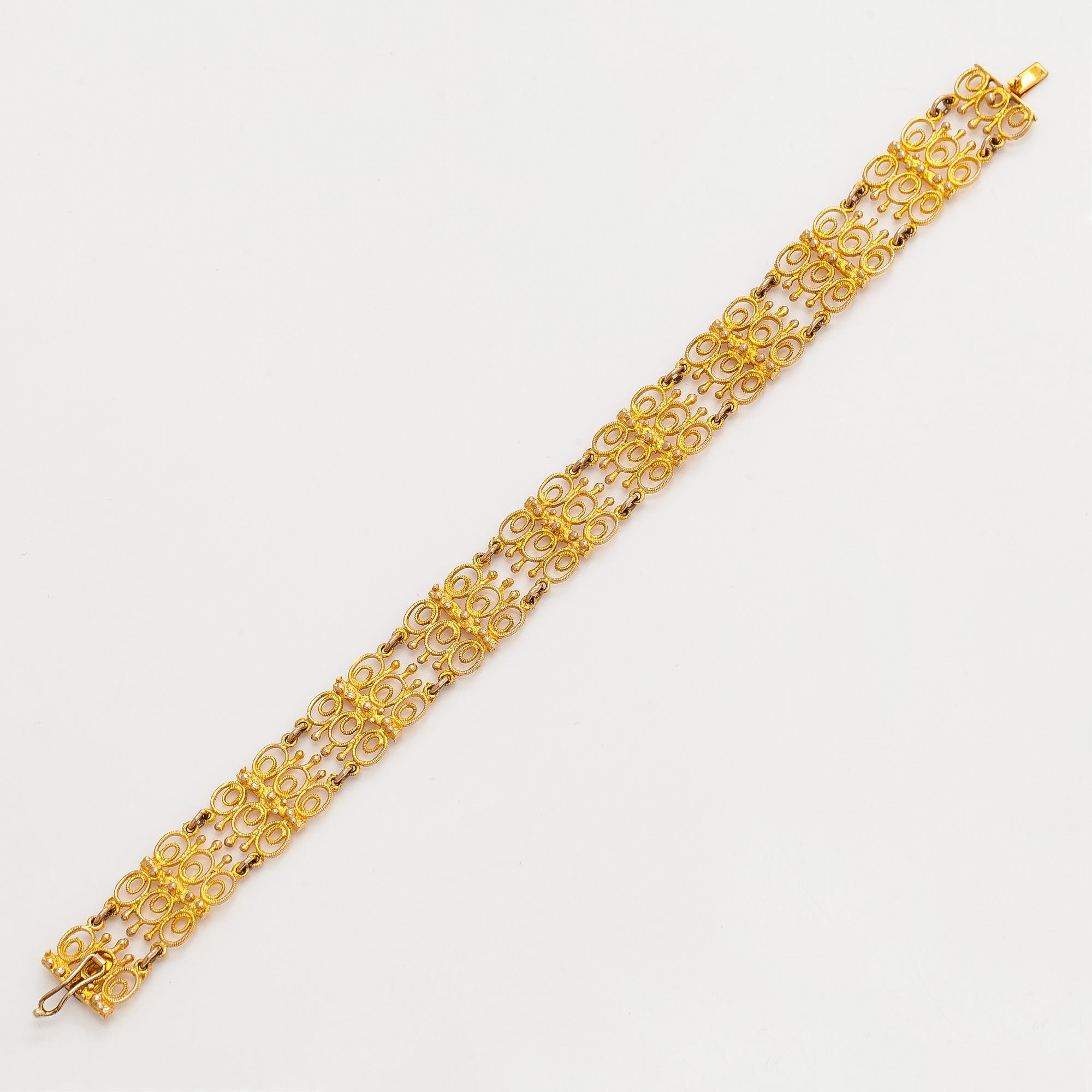 Esko Raitanen, collier, armband och örhängen, 14K guld, Helsingfors 1972.