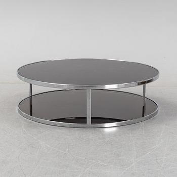 Rodolgo Dordoni, a 'Huber glass and chrome coffe table for Minotti.