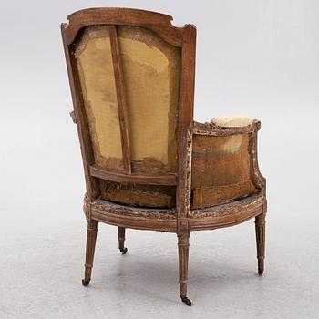 A French armchair, Directoire, early 19th century.