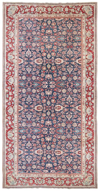 An antique cotton Agra of 'Ziegler Mahal' design, Northern India, c. 647 x 330 cm.