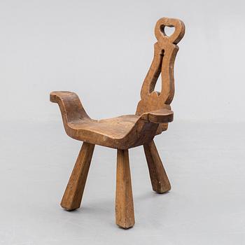 A STOOL, oak, early 20th century.